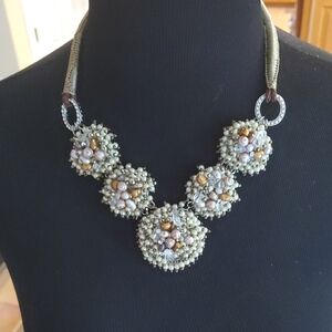 Elegant Beaded Necklace with Gold and Silver Accents